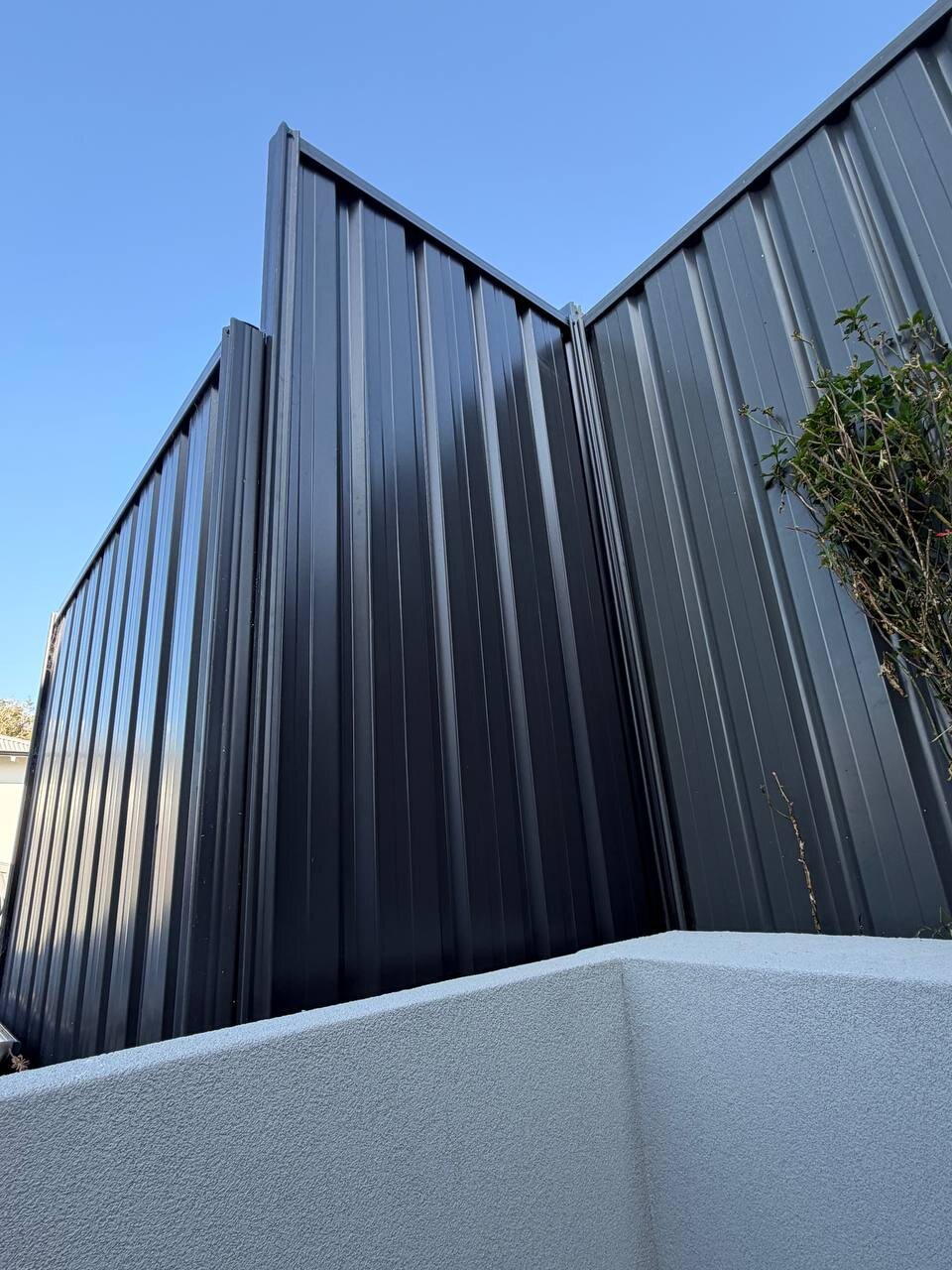 Black Colorbond fence corner