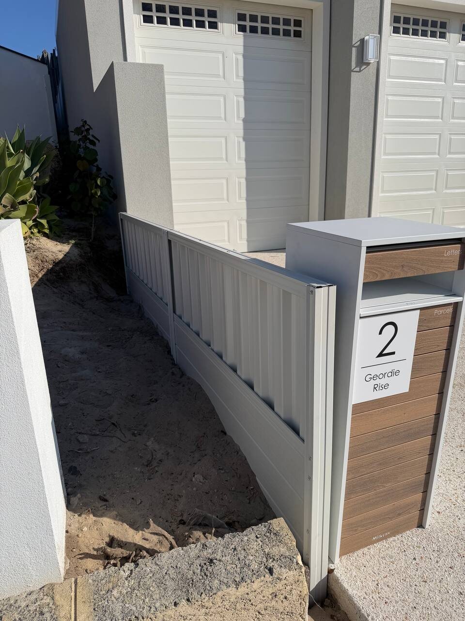 Front fence and letterbox
