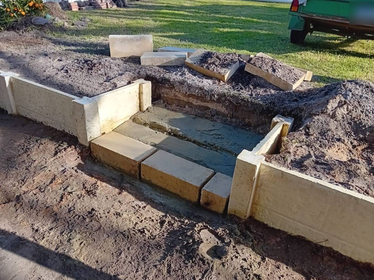 Work in progress: steps set into the retaining wall